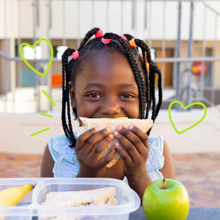 Young girl eating School lunch